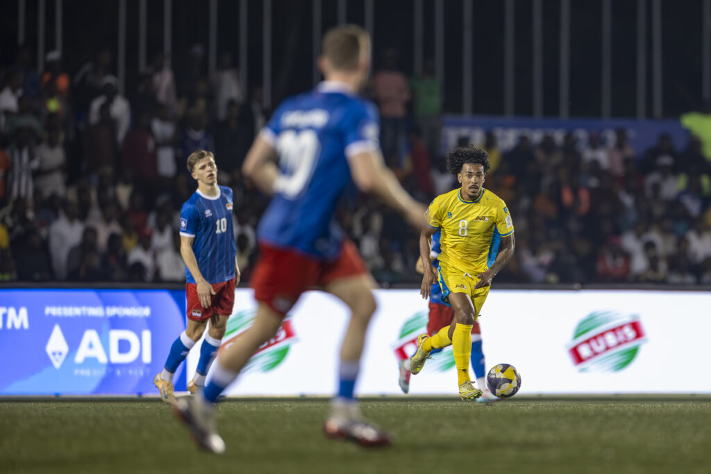 KIGALI, RWANDA - MARCH 29: W. Bennett #08 (R) of Aruba dribbles past Marcel Büchel #10 (L) of Liechtenstein in the FIFA Series 2026 Rwanda Group B final on Sunday at Kigali Pelé Stadium in Kigali, Rwanda (Photo by © Davyne Croes/DAC Image)